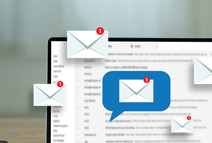 man reading e-mail on smartphone email inbox and email with lapt